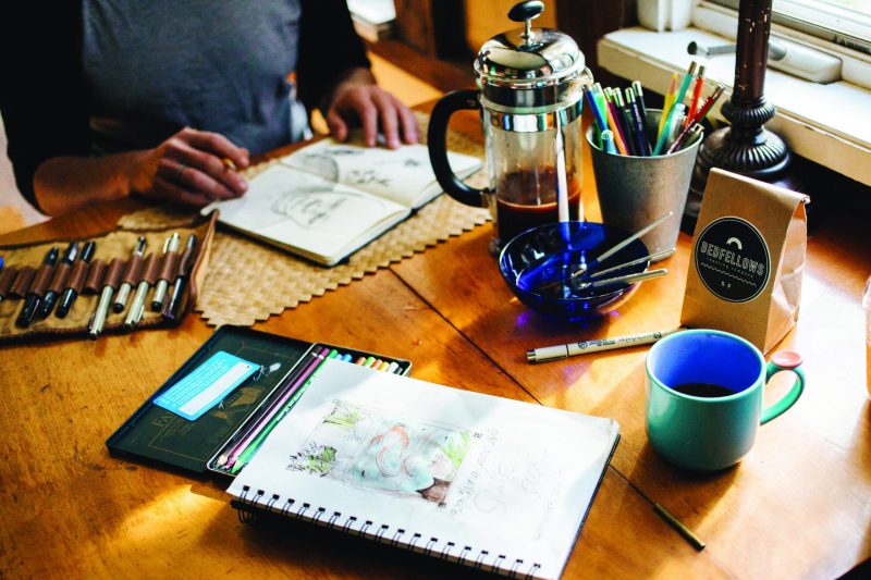 artist-working-at-desk