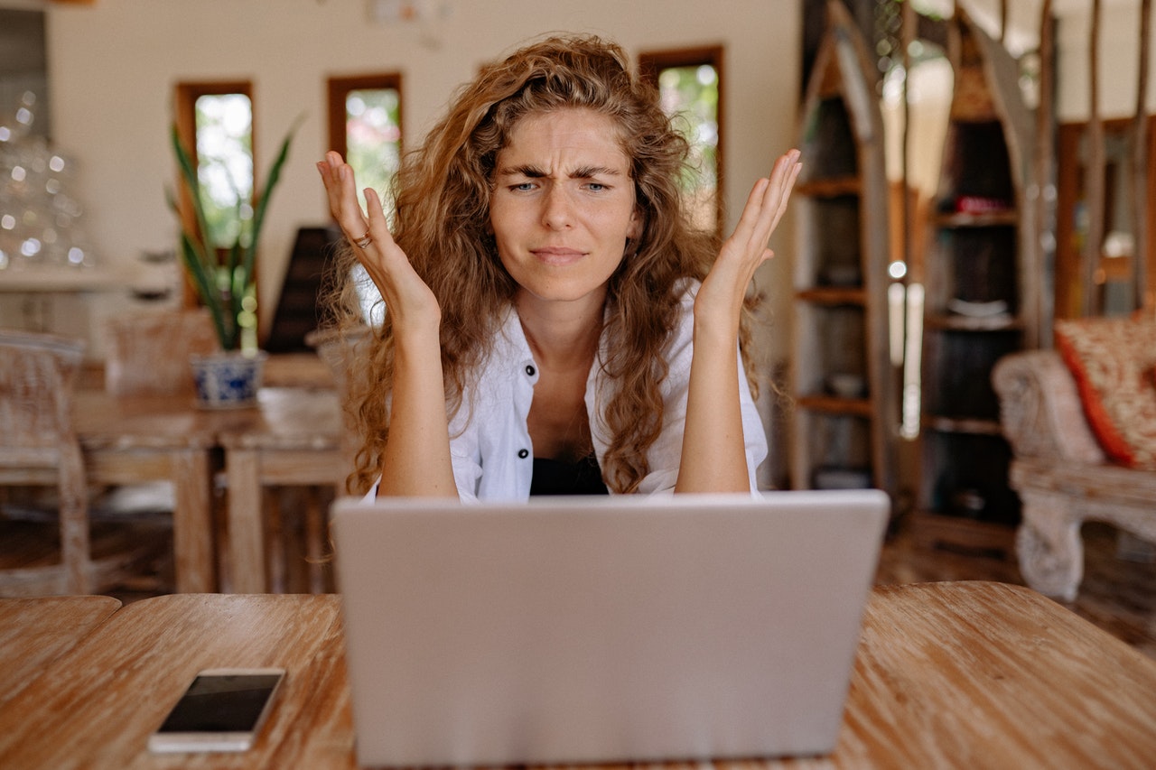 female-in-front-of-laptop-frustrated