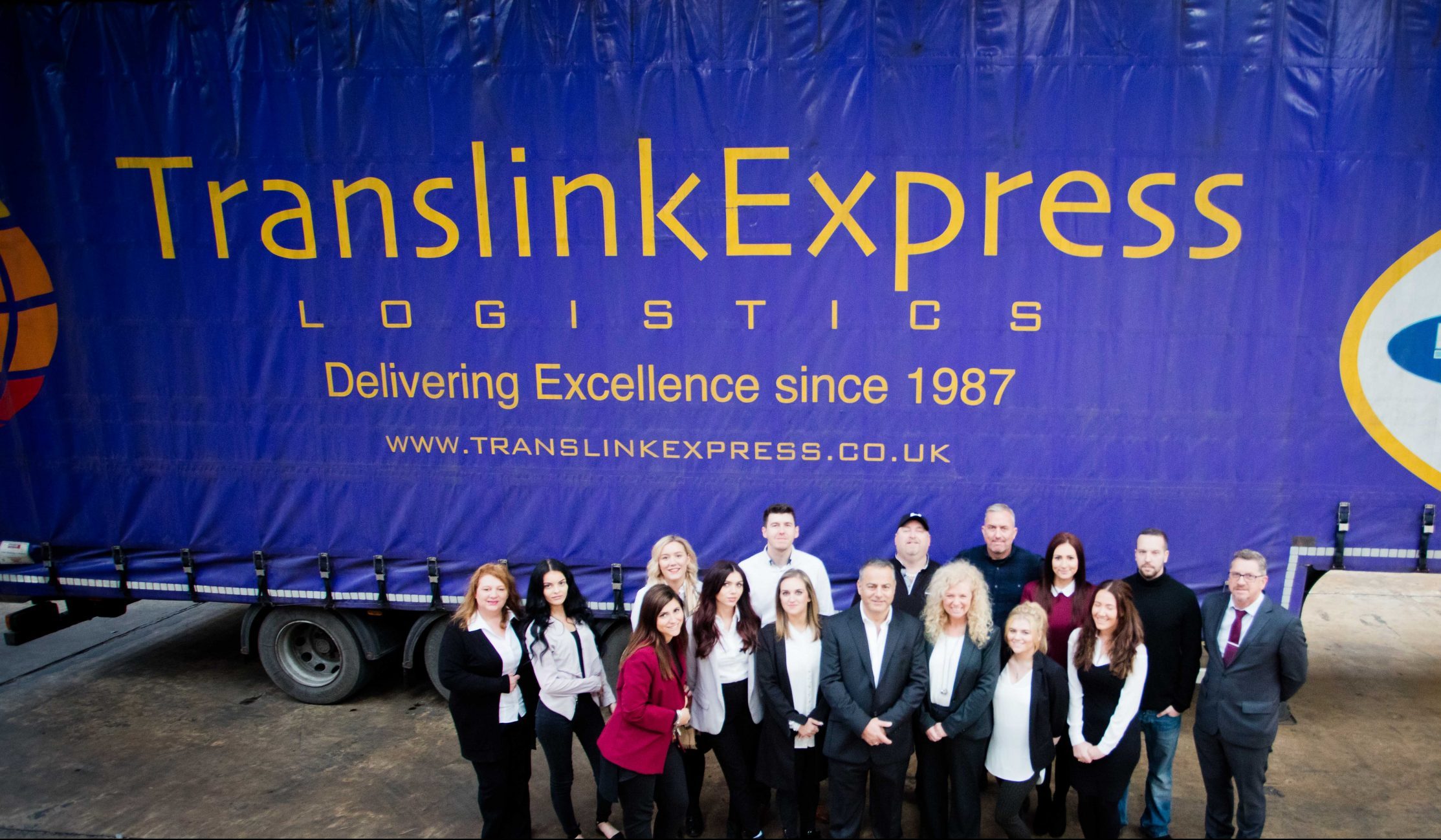 Truck-and-people-in-front-translink-team